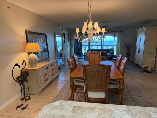 a bathroom with a mirror and cabinets