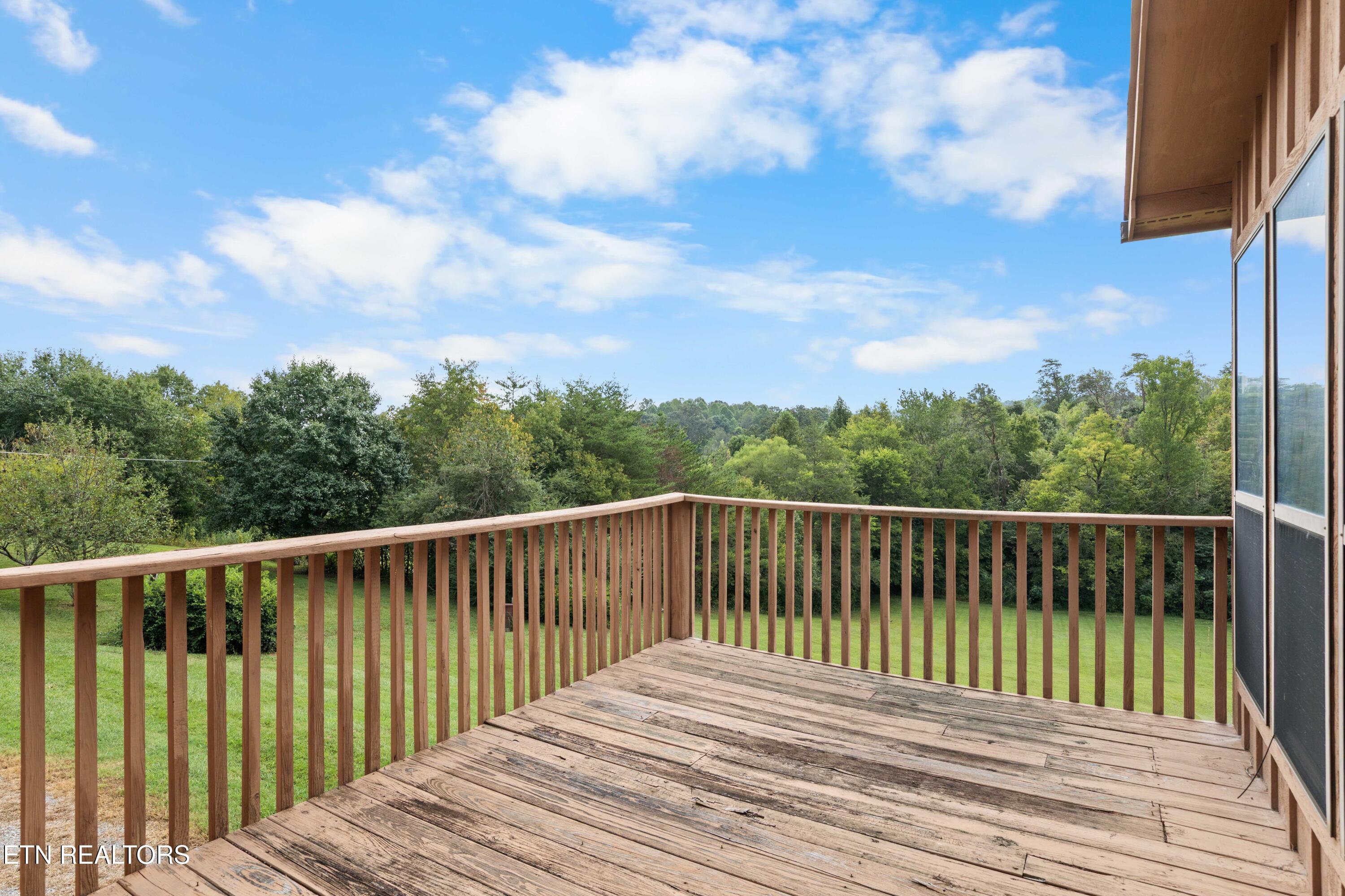 3911 Miser Station Road Louisville, TN 37777 - Photo 31 of 49 Deck overlooking the acreage