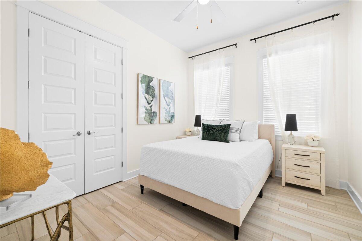 73 Dune Comet Lane, Unit B Inlet Beach, FL 32461 - Photo 13 of 25 a bedroom with a bed and a closet