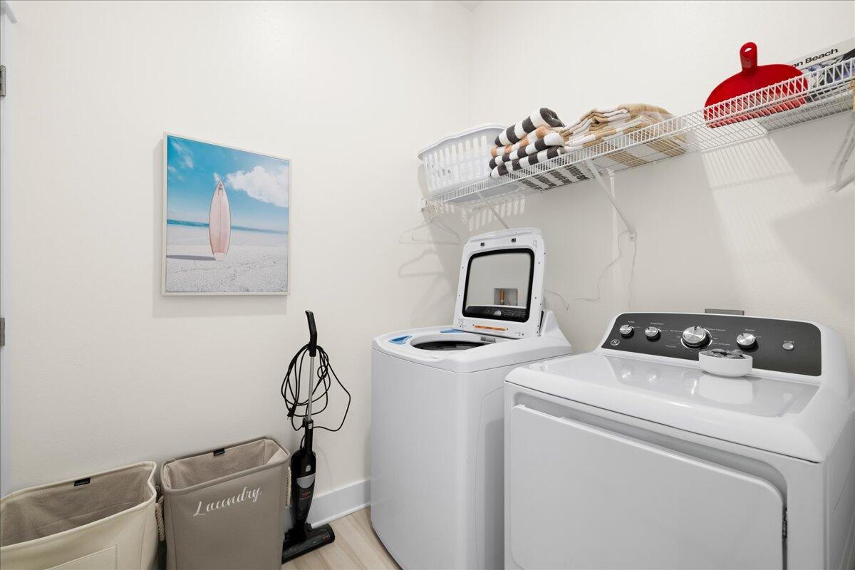 73 Dune Comet Lane, Unit B Inlet Beach, FL 32461 - Photo 17 of 25 a bathroom with a toilet and a sink