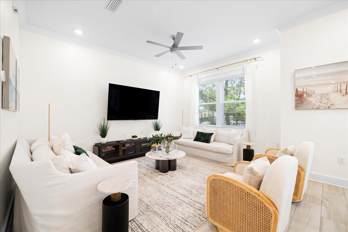 73 Dune Comet Lane, Unit B Inlet Beach, FL 32461 - Photo 5 of 25 a living room with furniture and a flat screen tv