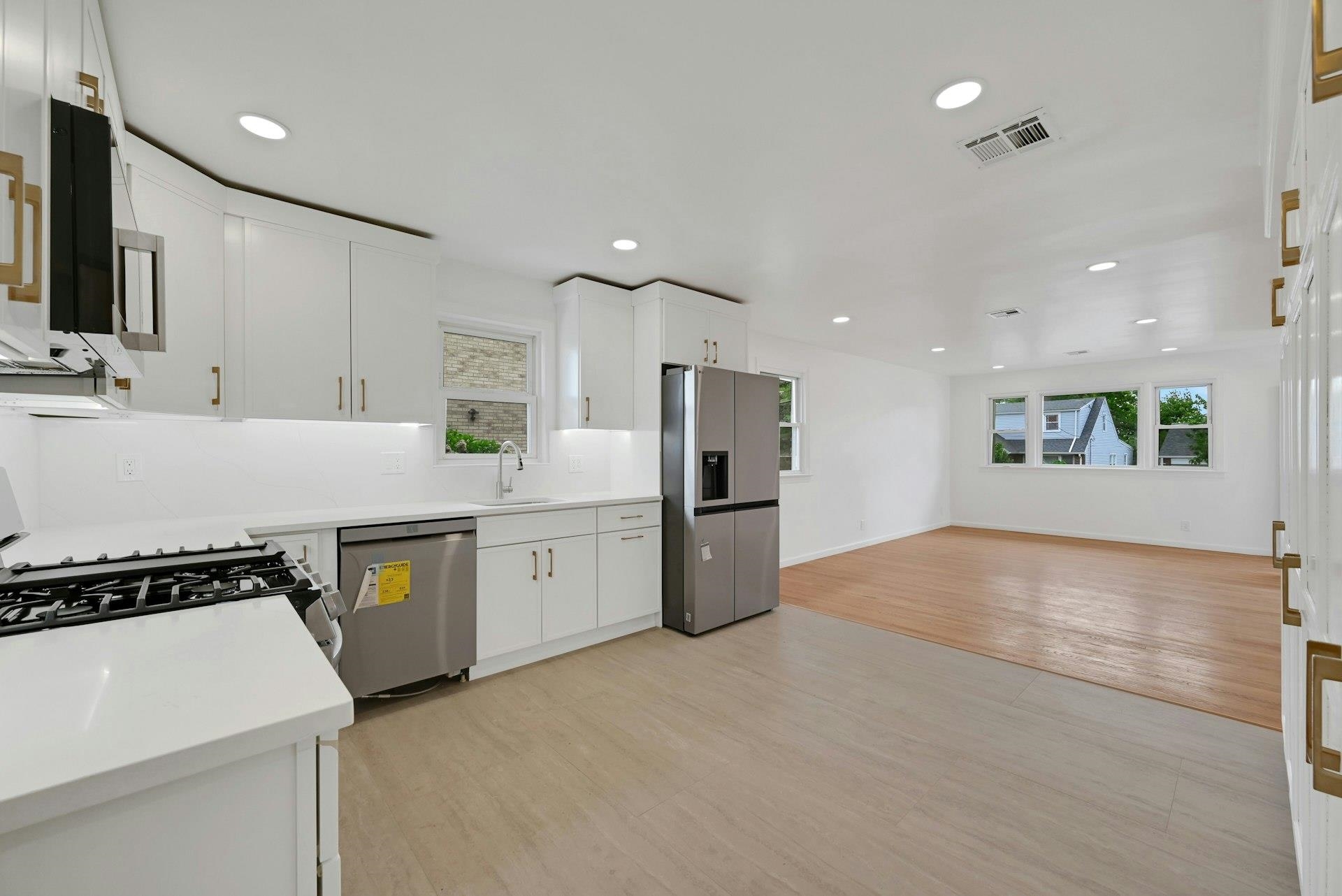 17 Arn Terrace Secaucus, NJ 07094 - Photo 13 of 34 a kitchen with a refrigerator and a stove top oven