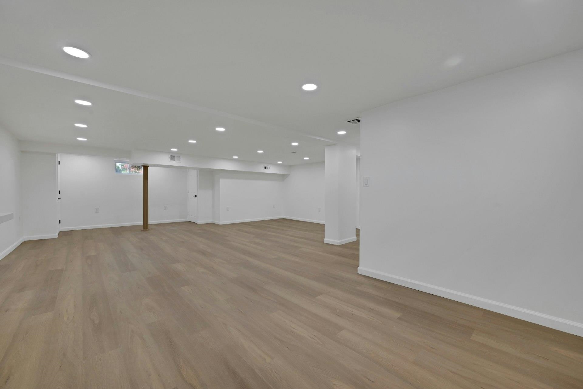 17 Arn Terrace Secaucus, NJ 07094 - Photo 26 of 34 a view of a big room with wooden floor