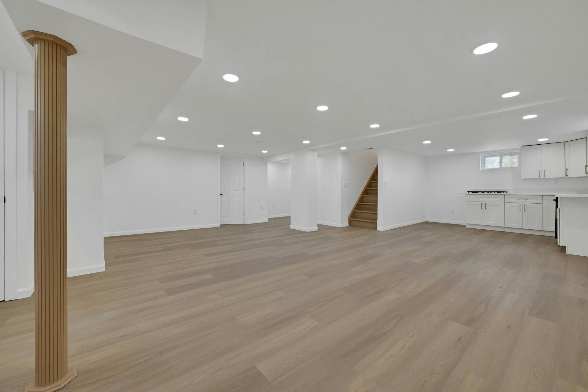 17 Arn Terrace Secaucus, NJ 07094 - Photo 28 of 34 a view of an empty room with wooden floor