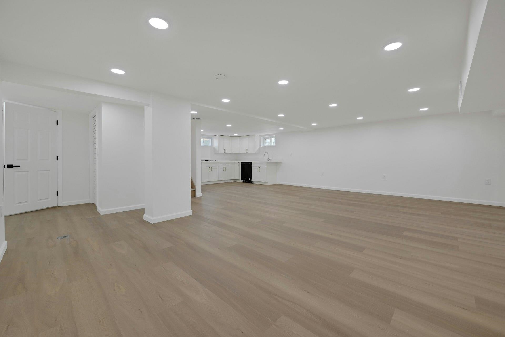 17 Arn Terrace Secaucus, NJ 07094 - Photo 29 of 34 a view of an empty room with wooden floor