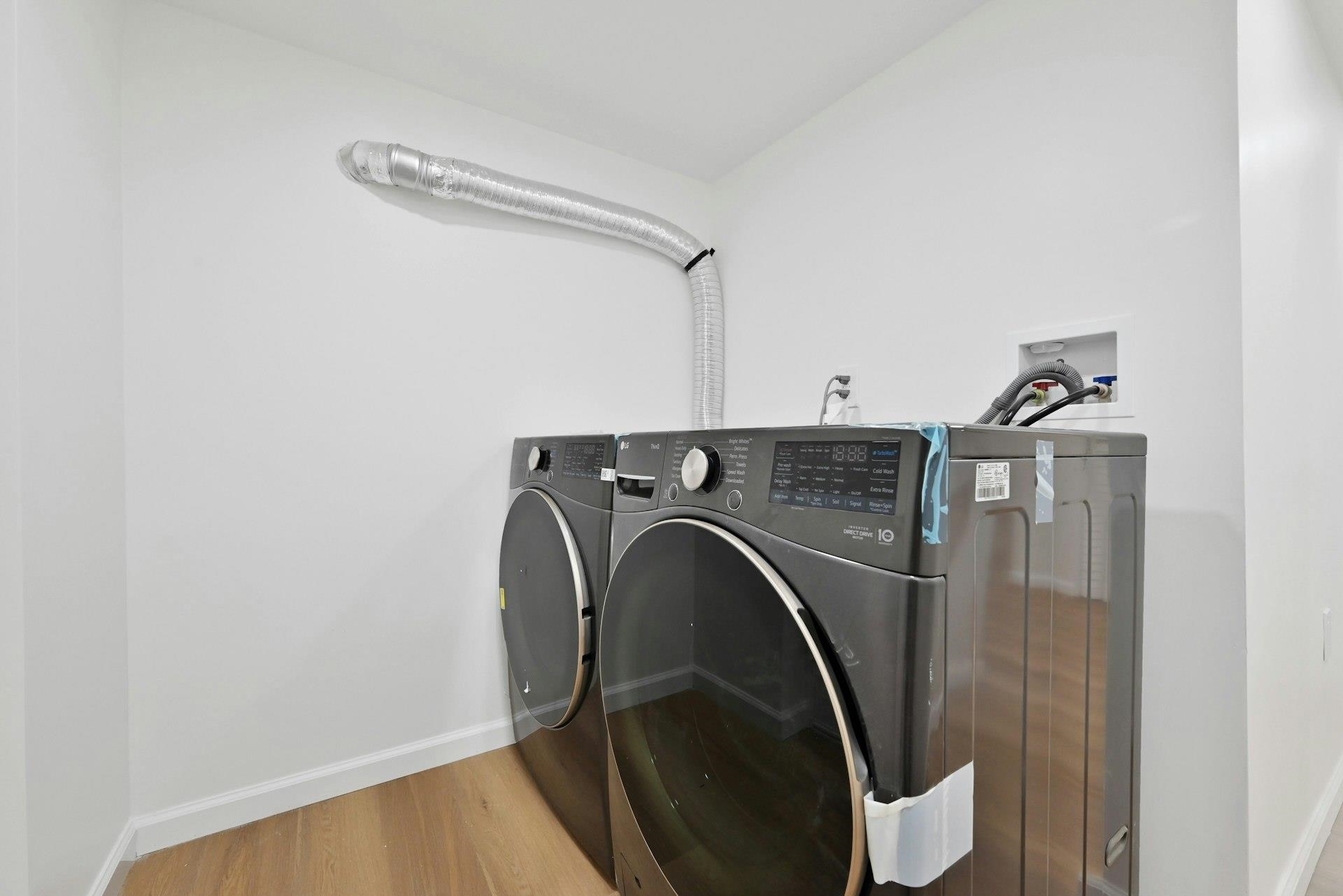 17 Arn Terrace Secaucus, NJ 07094 - Photo 32 of 34 a utility room with dryer and washer