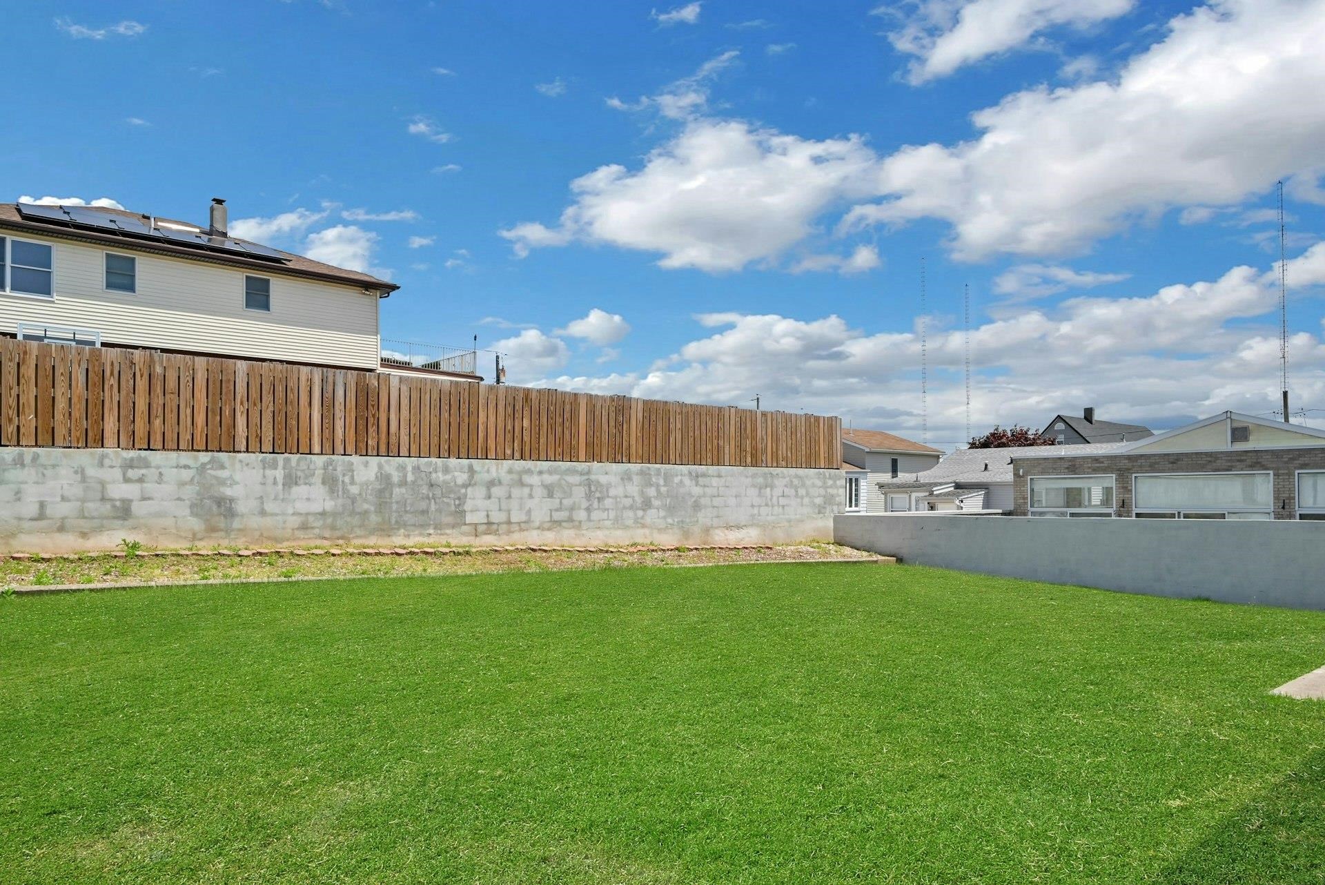 17 Arn Terrace Secaucus, NJ 07094 - Photo 5 of 34 a view of a backyard with a garden