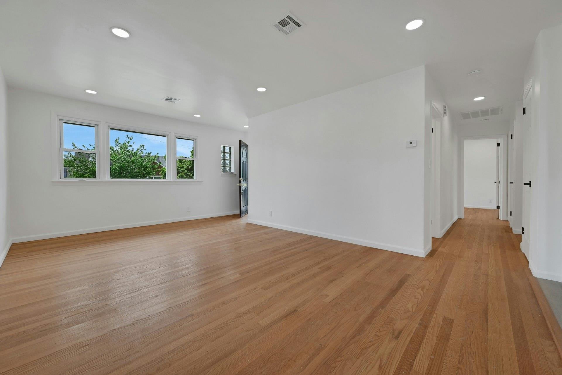 17 Arn Terrace Secaucus, NJ 07094 - Photo 6 of 34 a view of livingroom with hardwood floor and window