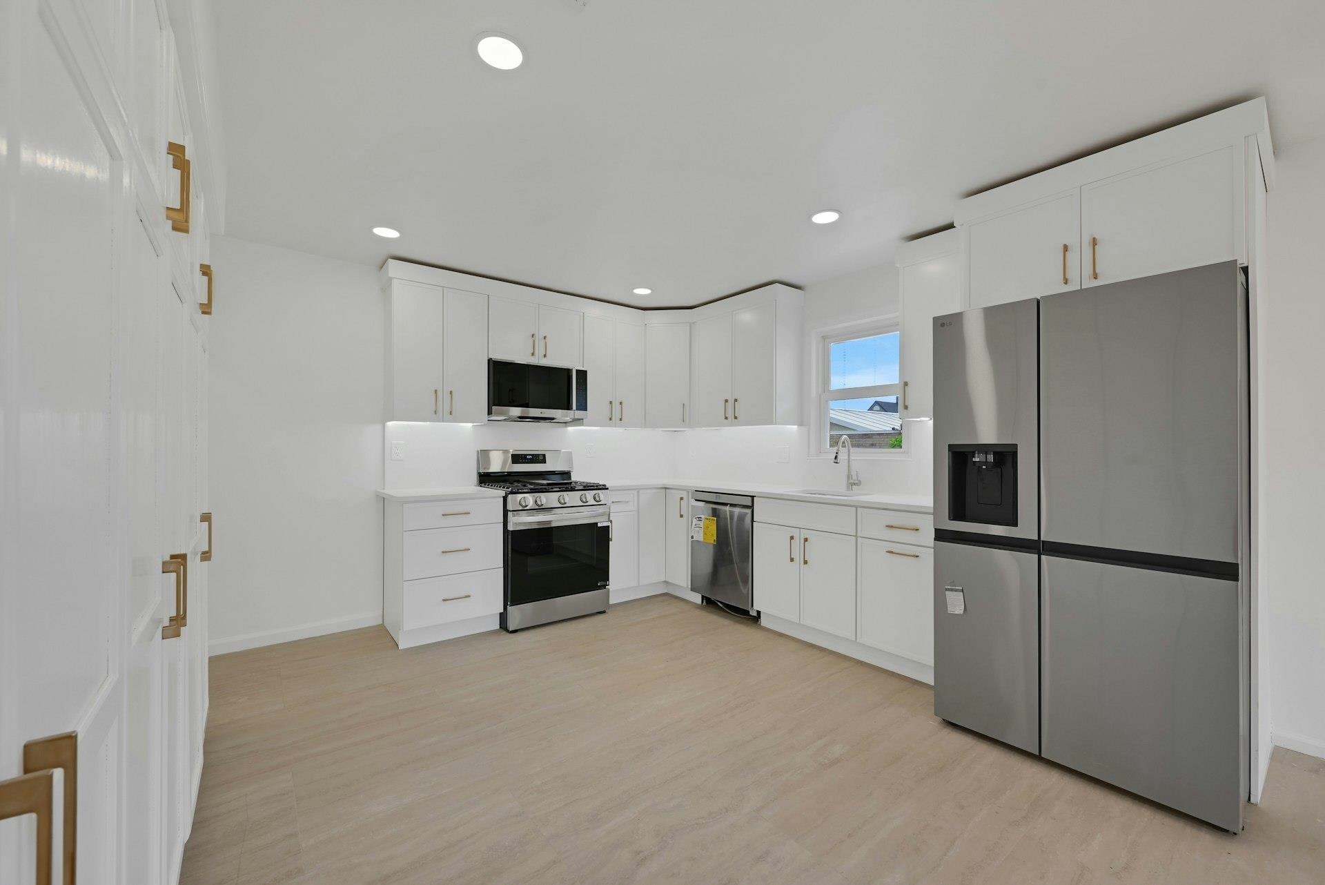 17 Arn Terrace Secaucus, NJ 07094 - Photo 10 of 34 a kitchen with a refrigerator stove and microwave