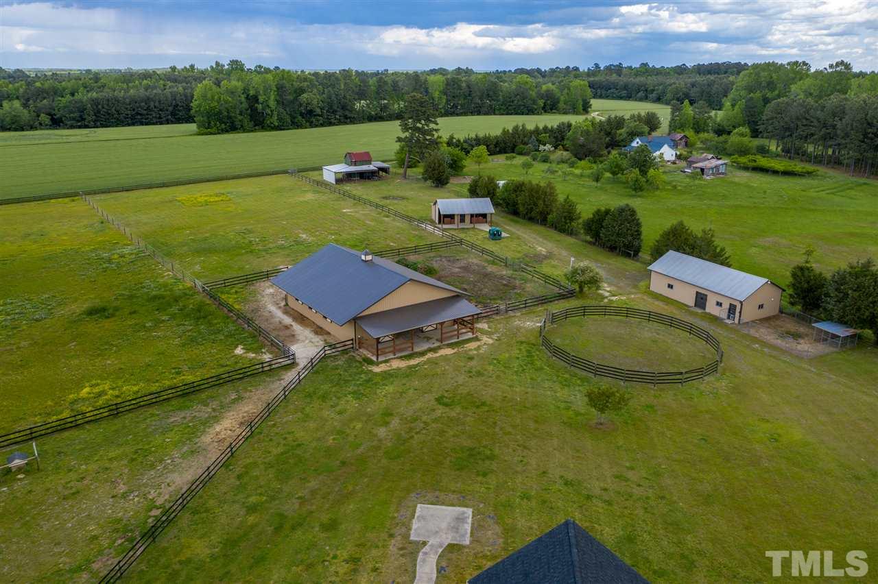 1760 Pilot-Riley Road Zebulon, NC 27597 - Photo 22 of 30 an aerial view of a house with a garden