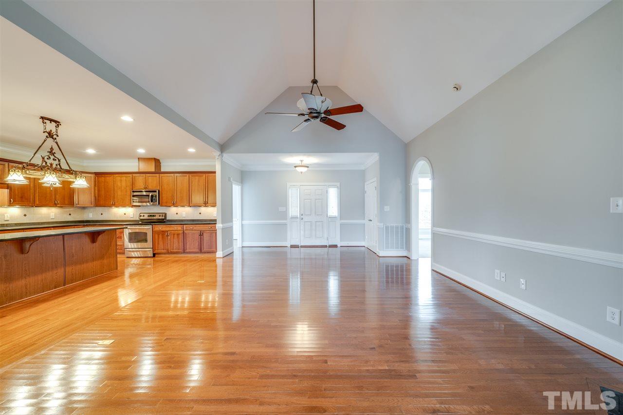 1760 Pilot-Riley Road Zebulon, NC 27597 - Photo 8 of 30 a view of a kitchen and an empty room
