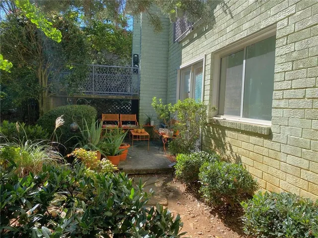 front view of a house with a patio