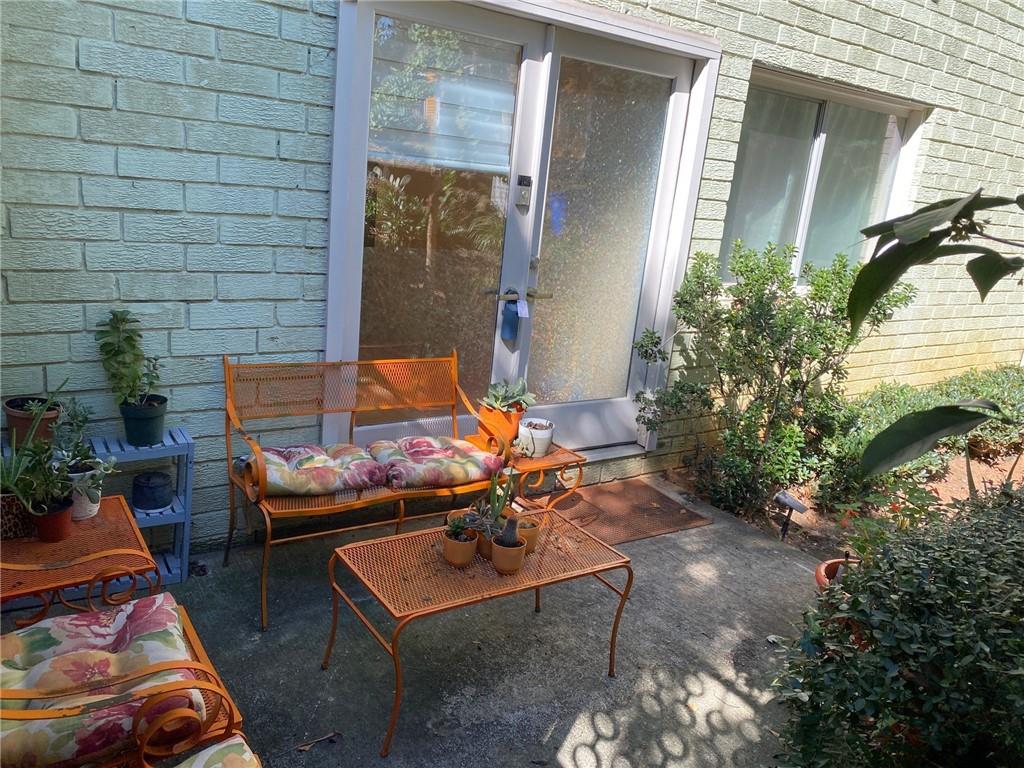 181 Powell Street Southeast, Unit 2 Atlanta, GA 30316 - Photo 25 of 47 a backyard of a house with seating space