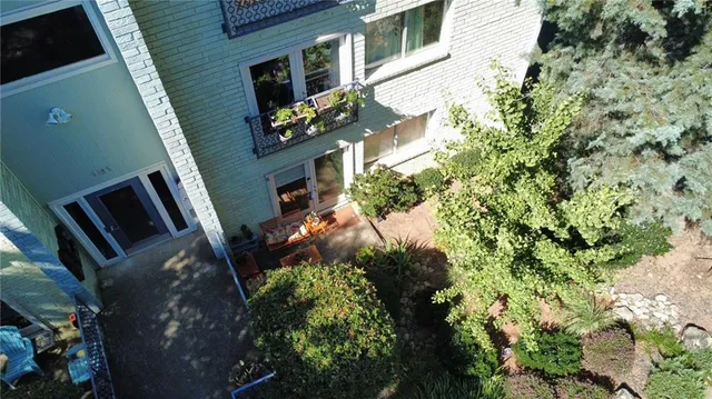 a backyard of a house with lots of green space