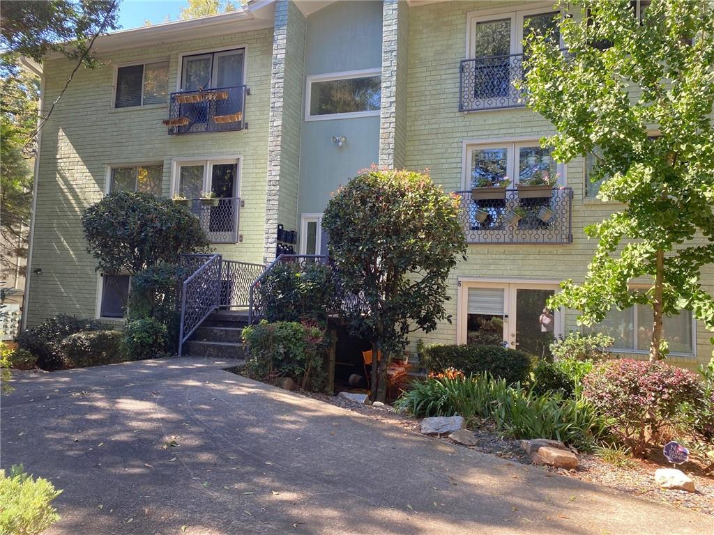 181 Powell Street Southeast, Unit 2 Atlanta, GA 30316 - Photo 31 of 47 a house with a tree in front of it