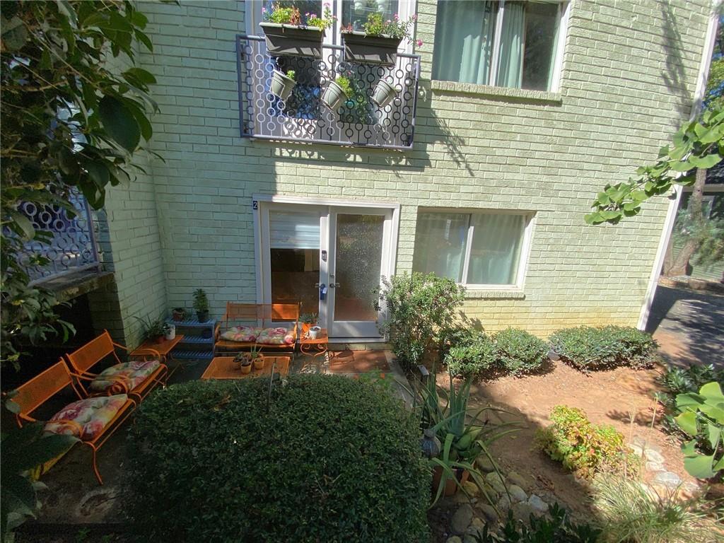 181 Powell Street Southeast, Unit 2 Atlanta, GA 30316 - Photo 32 of 47 a view of a house with backyard and sitting area