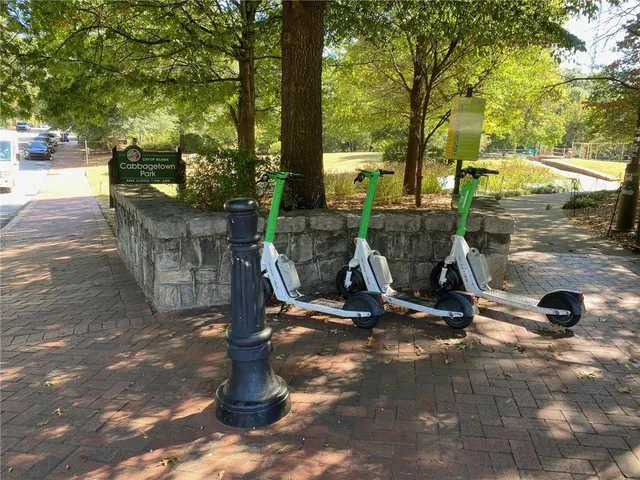 a view of a park with swings and slides