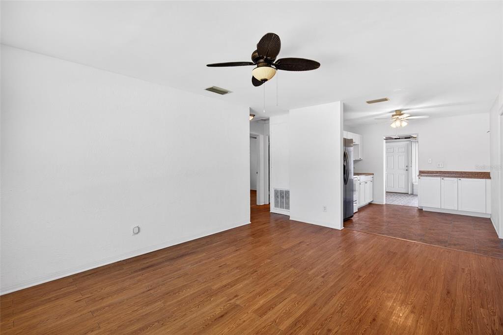47 Carol Road Ormond Beach, FL 32176 - Photo 2 of 54 a view of empty room with wooden floor