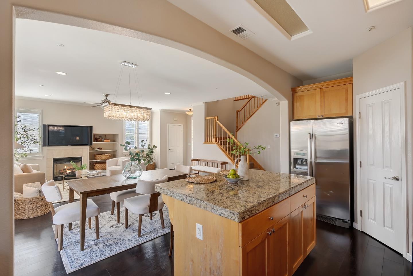 8850 Morey Way Gilroy, CA 95020 - Photo 13 of 34 a view of a kitchen with living room and furniture