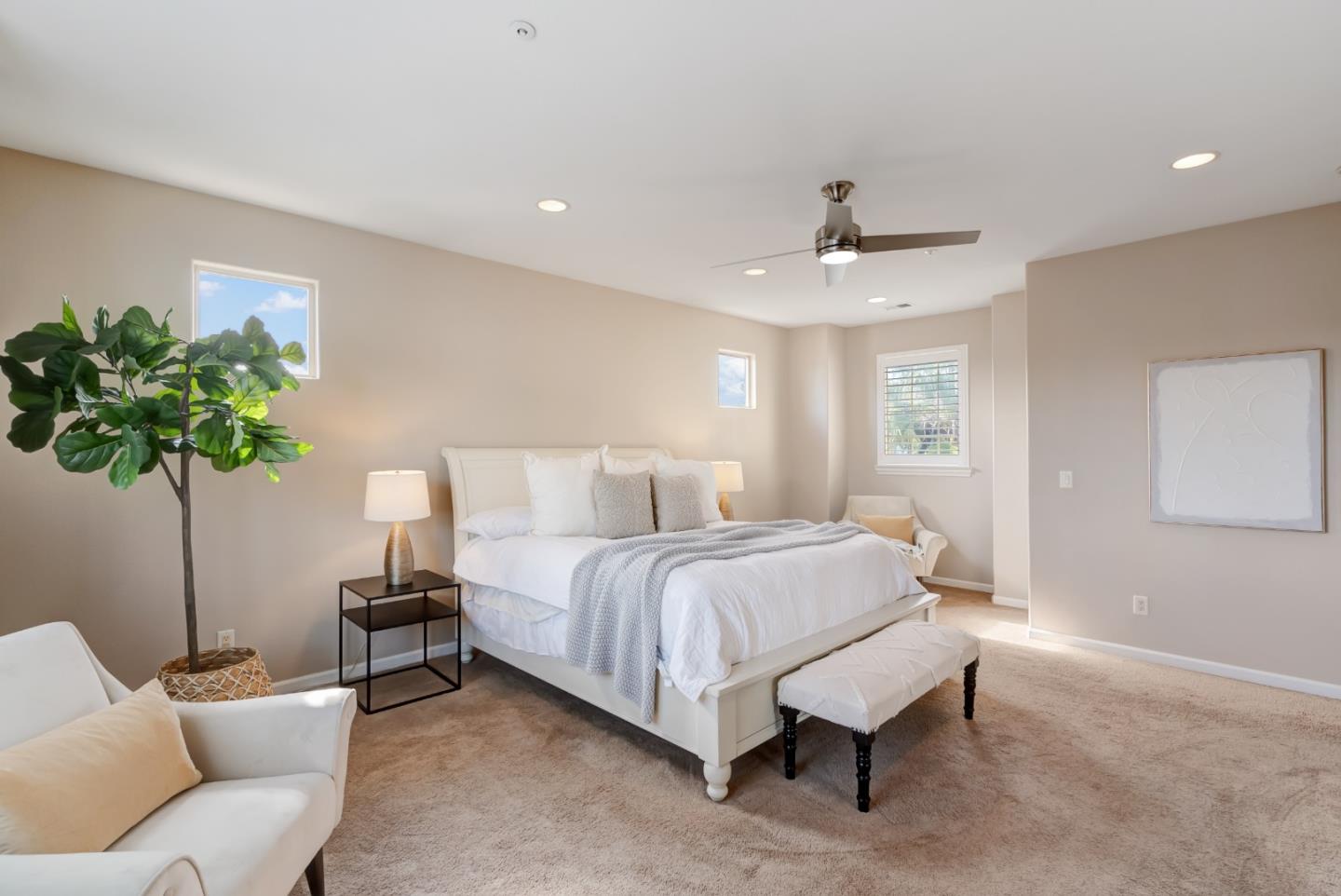 8850 Morey Way Gilroy, CA 95020 - Photo 23 of 34 a spacious bedroom with a bed and a plant