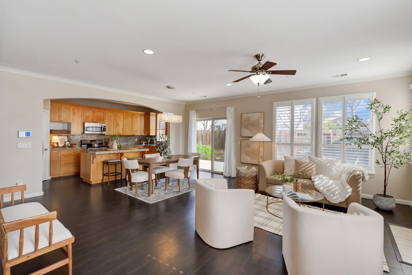 8850 Morey Way Gilroy, CA 95020 - Photo 6 of 34 a living room with fireplace furniture and a large window