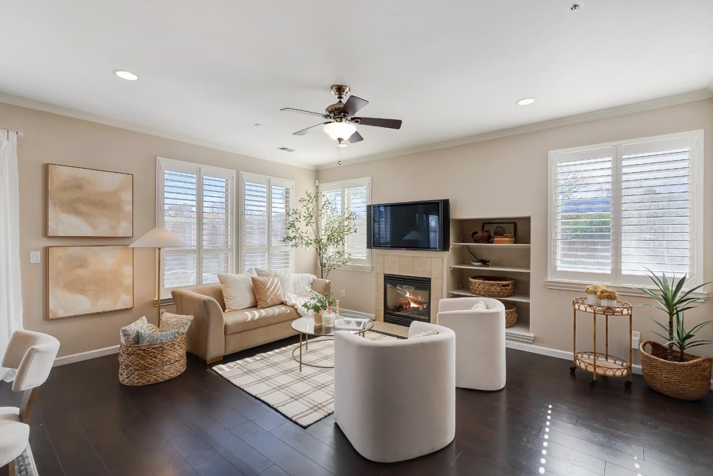 8850 Morey Way Gilroy, CA 95020 - Photo 7 of 34 a living room with furniture fireplace and a large window