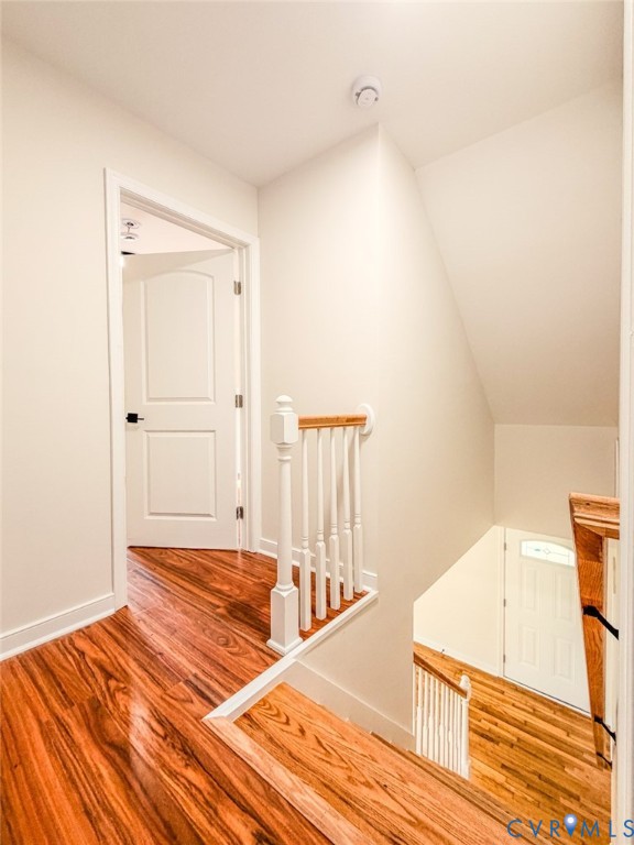 3409 Meadowbridge Road Richmond, VA 23222 - Photo 29 of 32 a view of a room with wooden floor and staircase