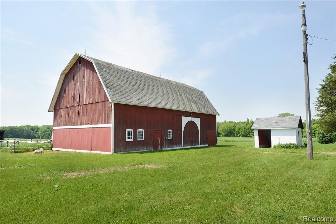 4355 North Eager Road Howell, MI 48855 - Photo 4 of 32 4 stall refurbished barn with tack room, rubberized flooring, and extra milk house.