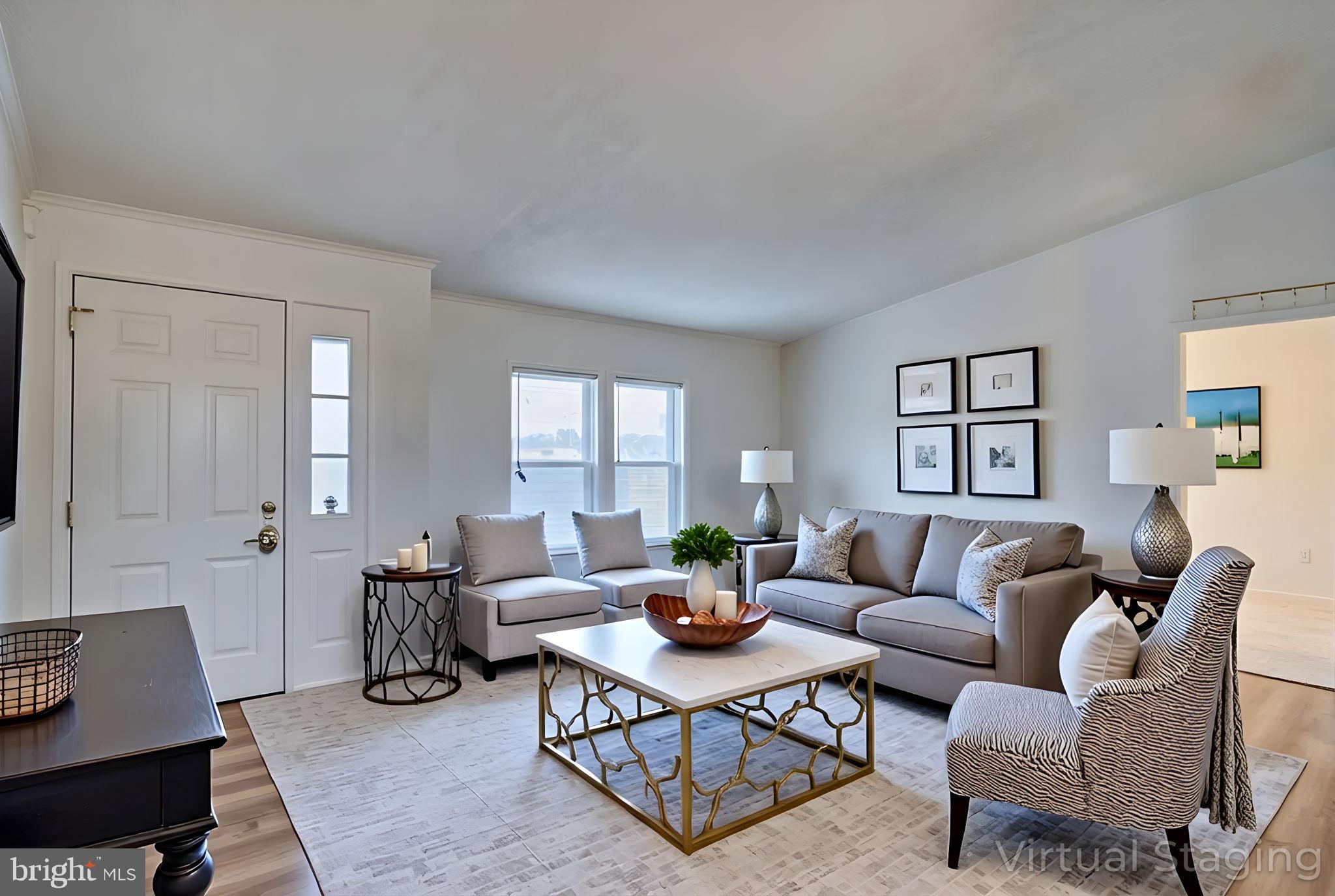 4285 Carpenter Bridge Road Felton, DE 19943 - Photo 12 of 45 a living room with furniture a rug and a window