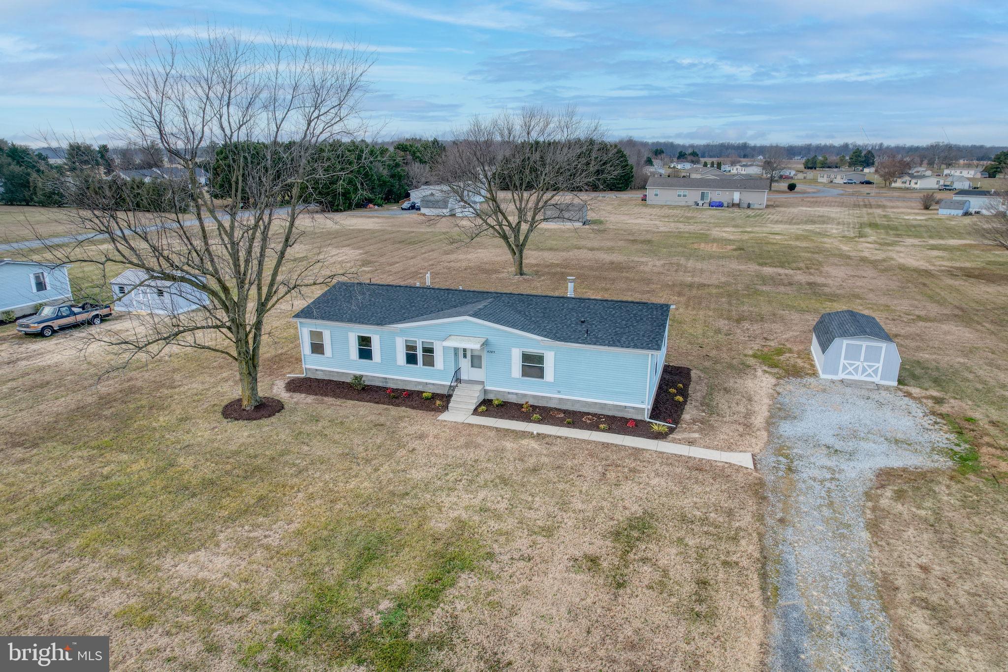 4285 Carpenter Bridge Road Felton, DE 19943 - Photo 2 of 45 a view of a house with a yard