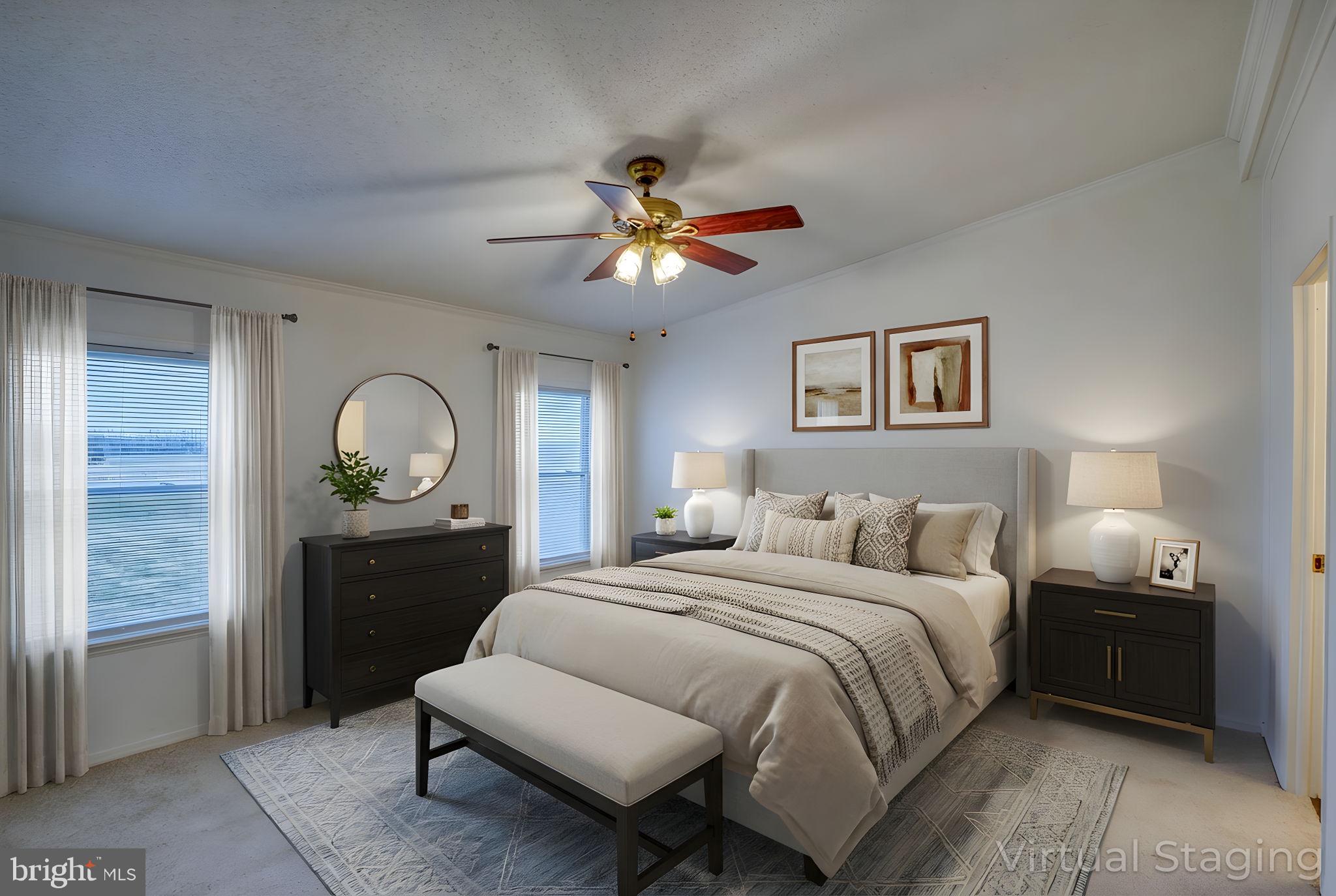 4285 Carpenter Bridge Road Felton, DE 19943 - Photo 32 of 45 a bedroom with a bed and a chandelier