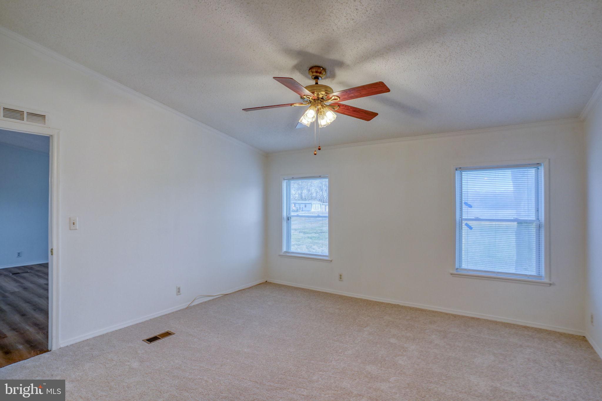 4285 Carpenter Bridge Road Felton, DE 19943 - Photo 34 of 45 a view of an empty room with a window