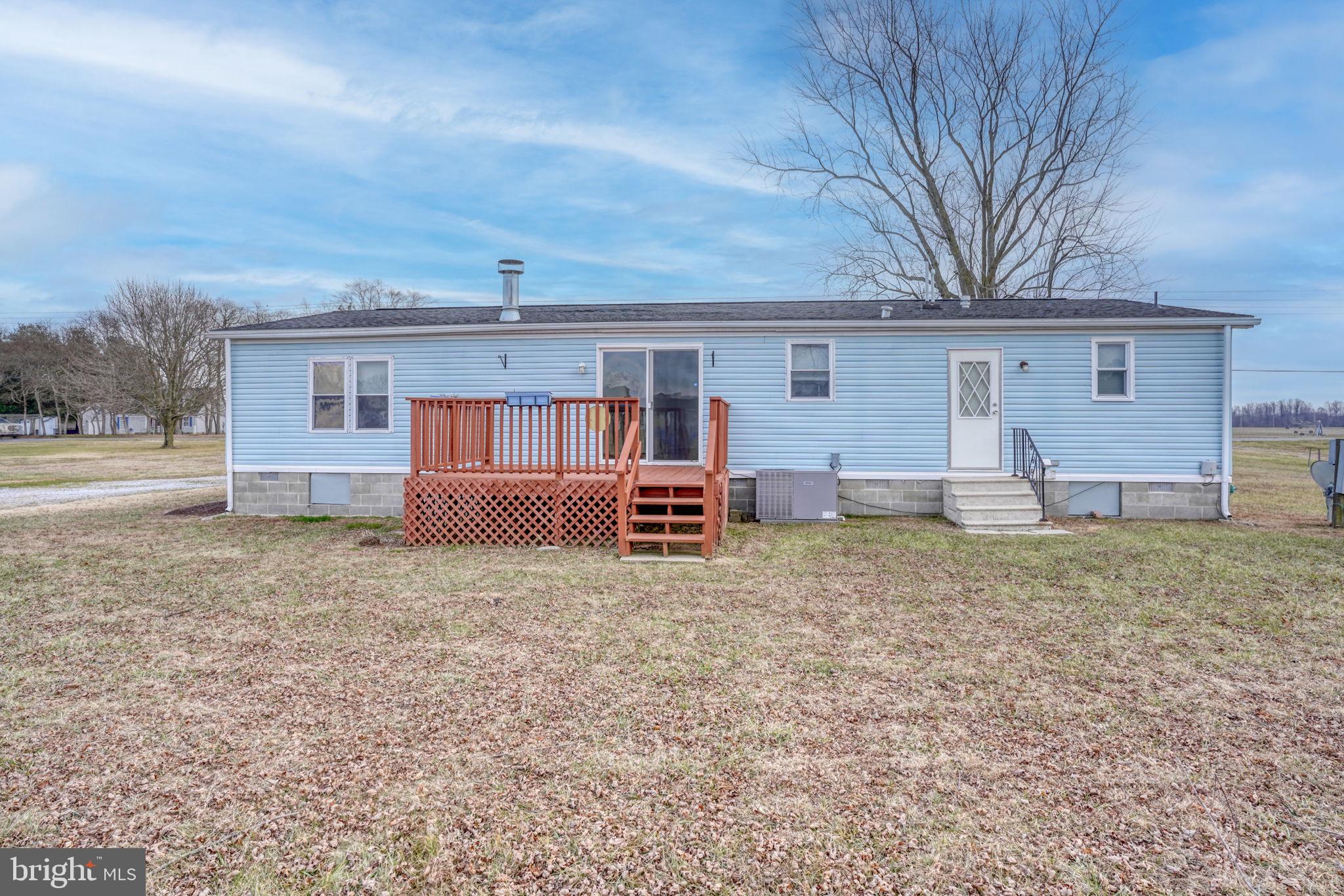 4285 Carpenter Bridge Road Felton, DE 19943 - Photo 7 of 45 a house view with a backyard space