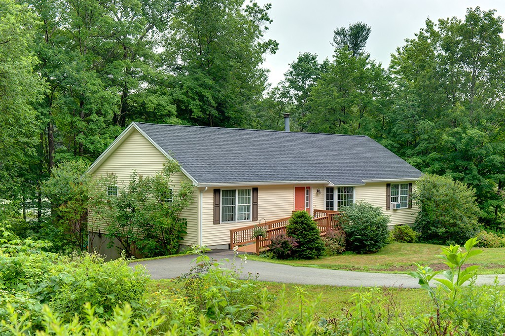64 Farm Pond Road Oakham, MA 01068 - Photo 18 of 20 a house view with a garden space