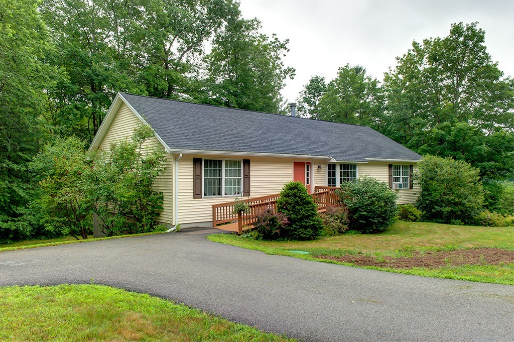 64 Farm Pond Road Oakham, MA 01068 - Photo 2 of 20 a view of a house with garden and yard