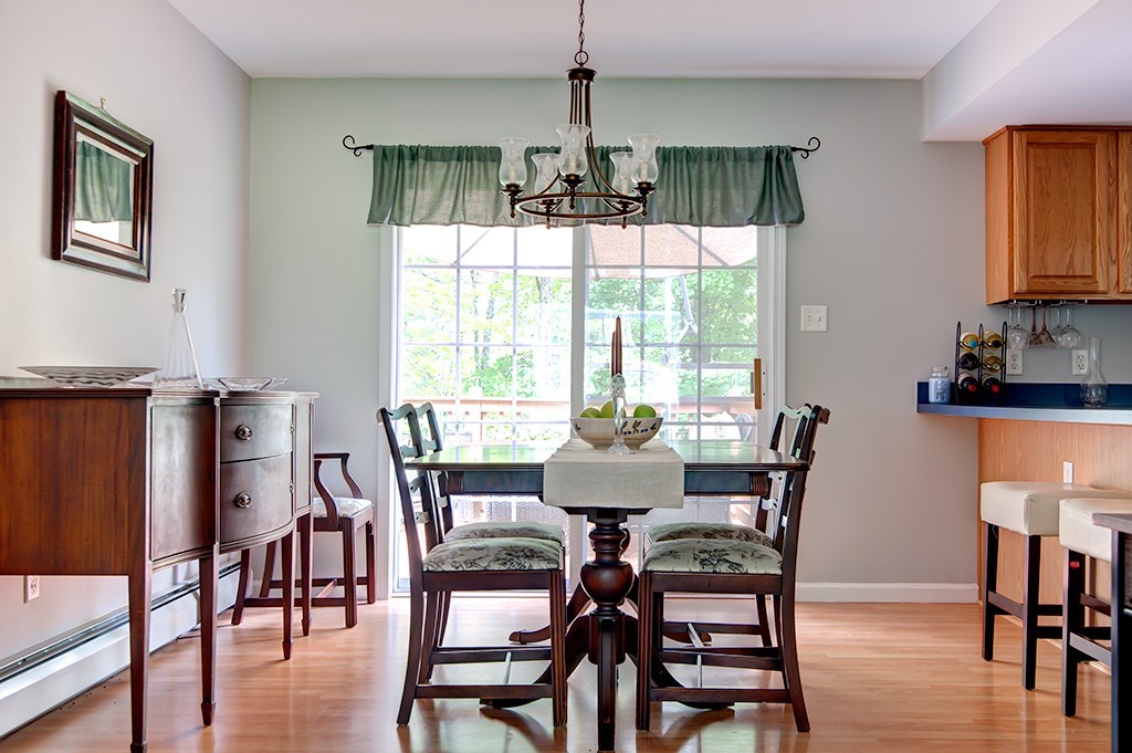 64 Farm Pond Road Oakham, MA 01068 - Photo 5 of 20 a dining room with furniture window and wooden floor