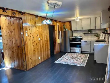 a view of an entryway with hardwood