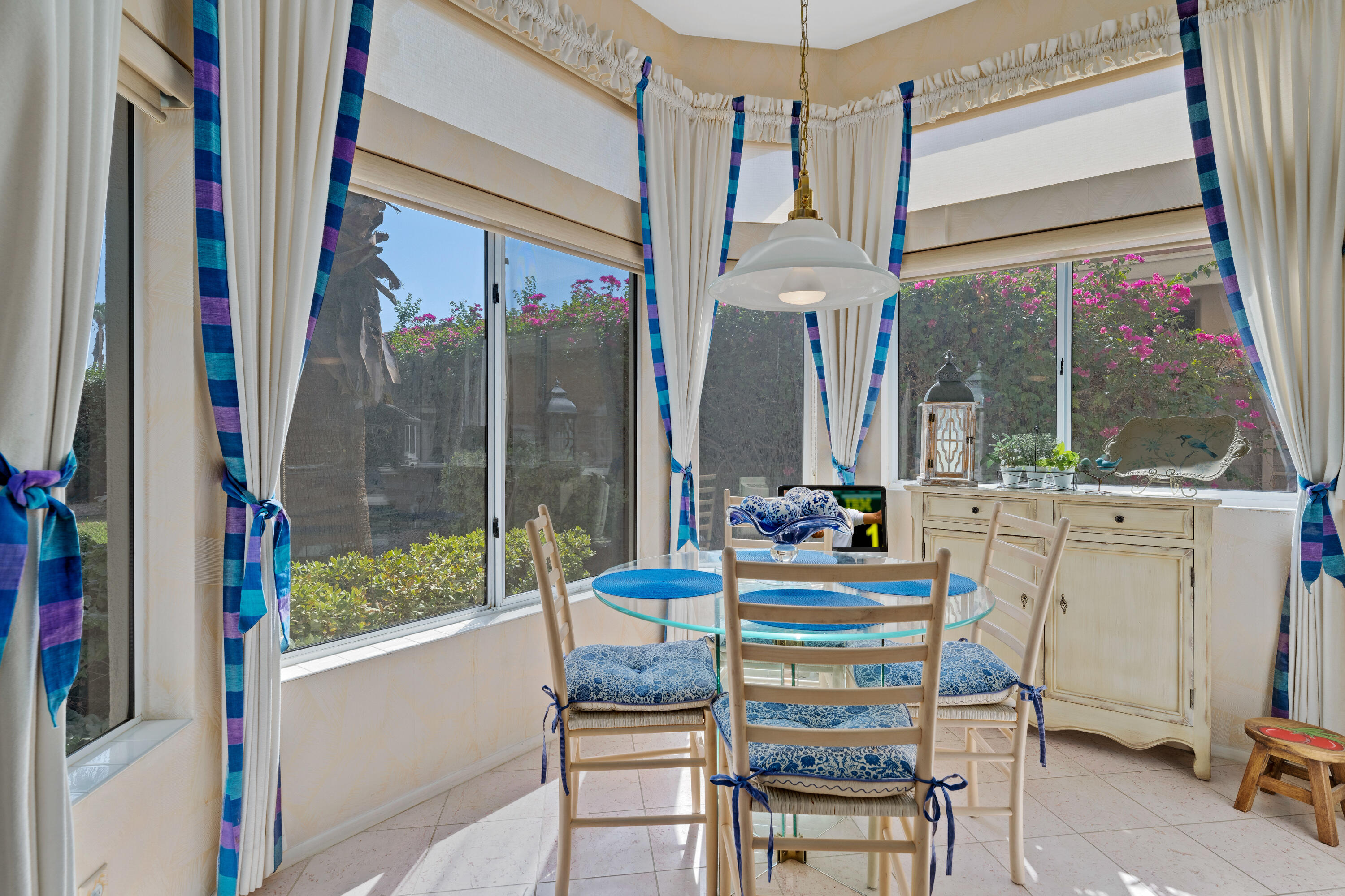 78274 Rainbow Drive Palm Desert, CA 92211 - Photo 16 of 24 a room with furniture and a large window