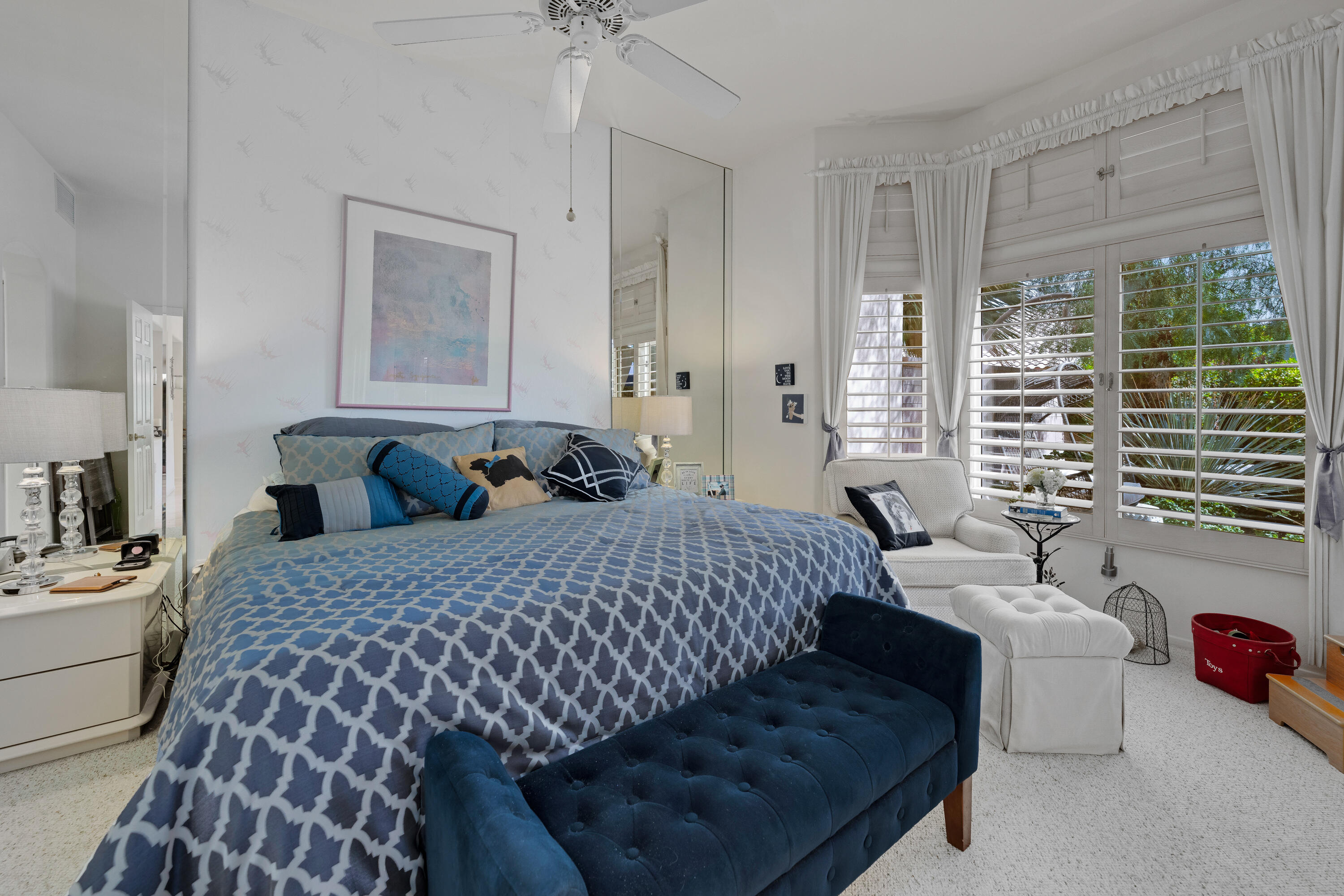 78274 Rainbow Drive Palm Desert, CA 92211 - Photo 18 of 24 a bedroom with a bed couch and window