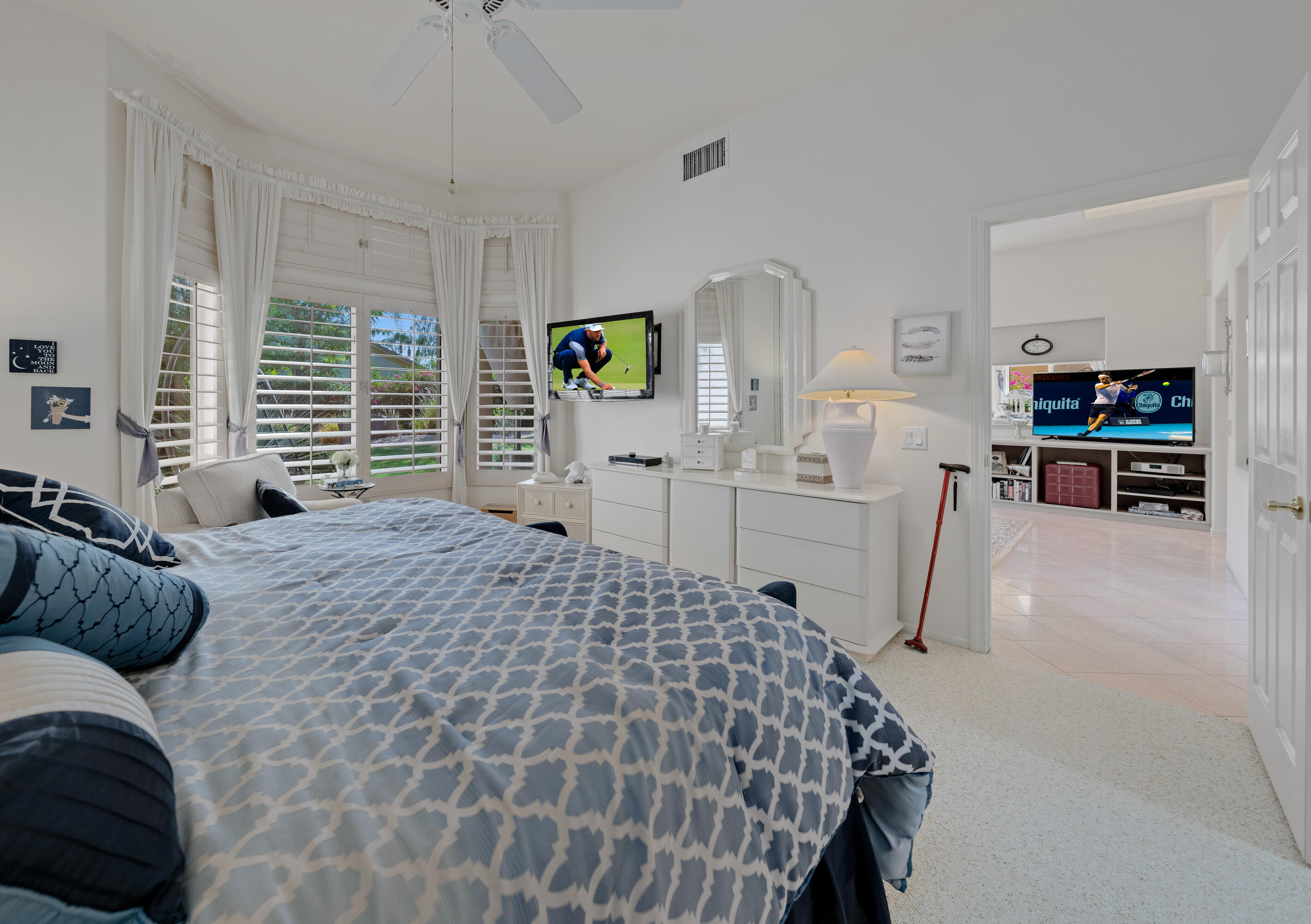 78274 Rainbow Drive Palm Desert, CA 92211 - Photo 19 of 24 a bedroom with a bed and furniture