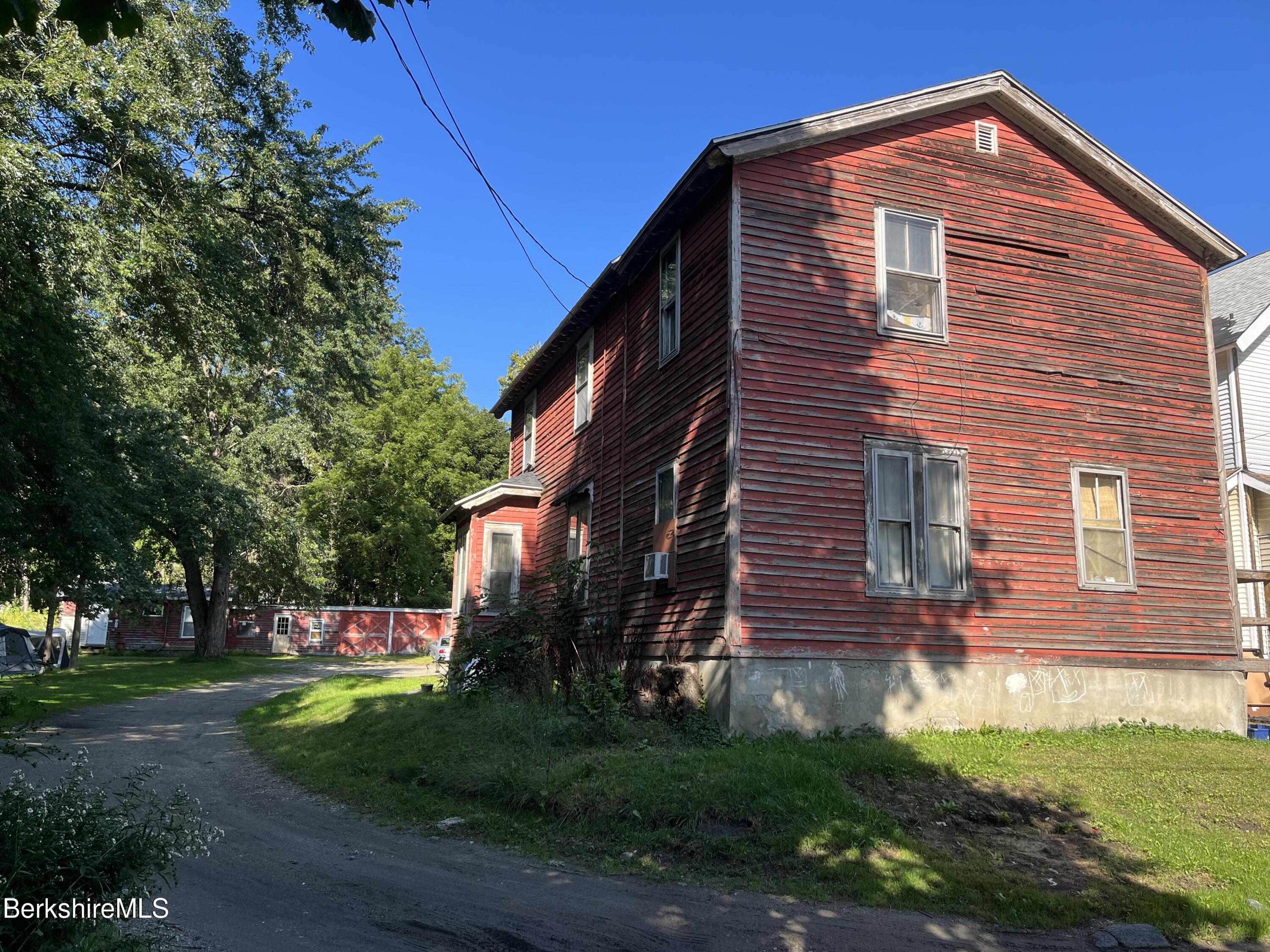 1 1/2 Cherry Street Pittsfield, MA 01201 - Photo 2 of 11 a view of a house with a yard