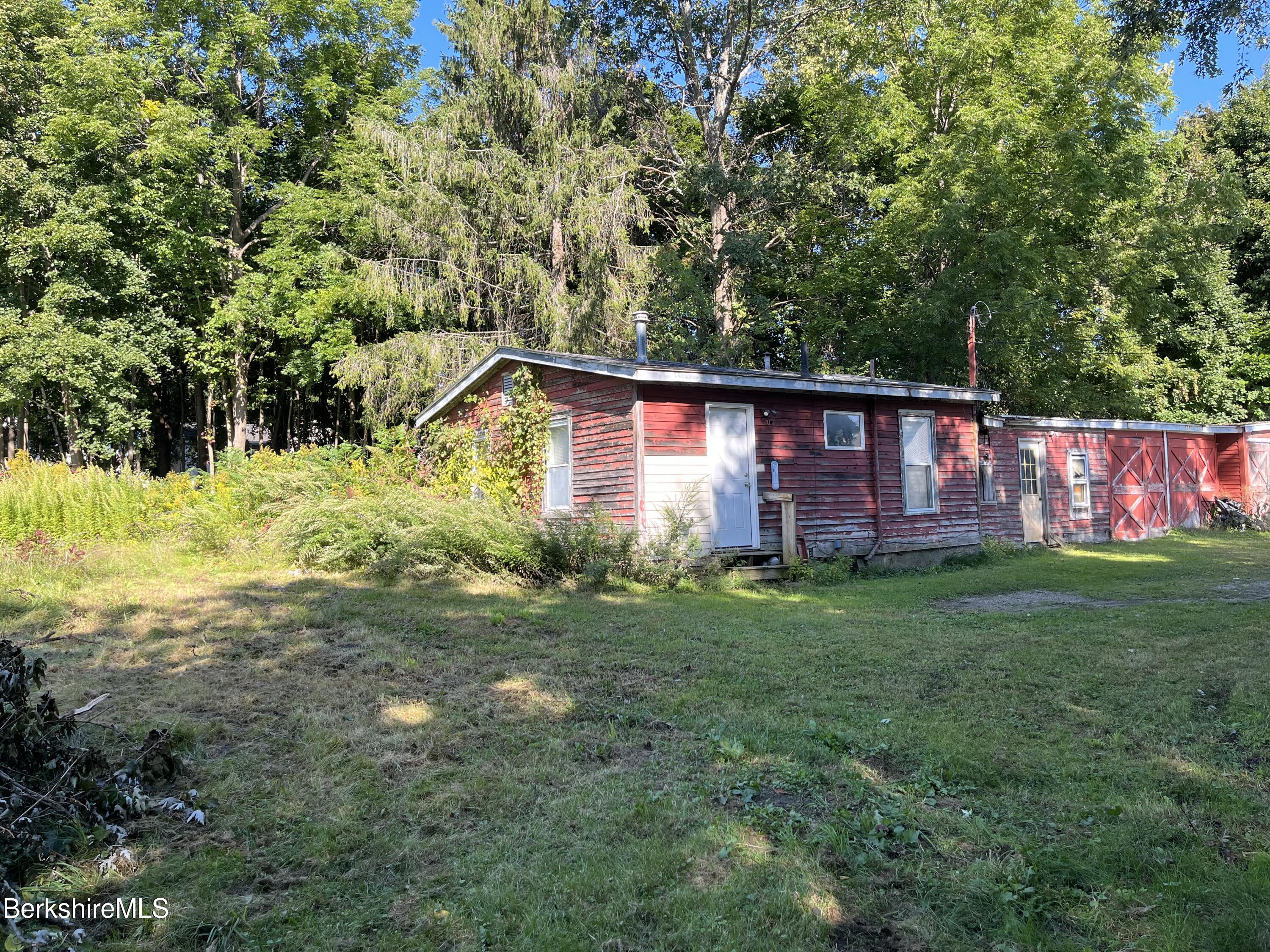 1 1/2 Cherry Street Pittsfield, MA 01201 - Photo 5 of 11 a view of a house with backyard and garden