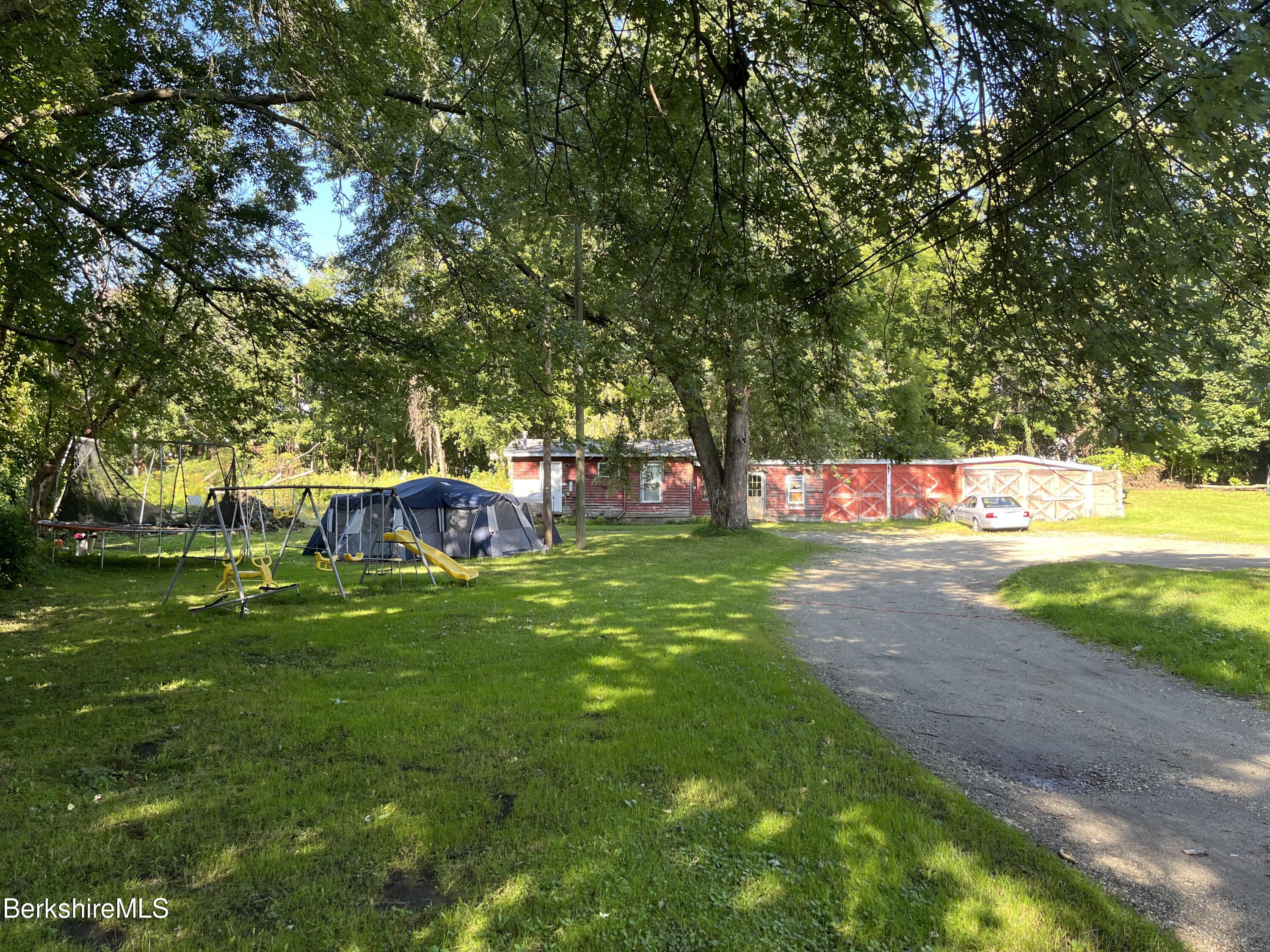 1 1/2 Cherry Street Pittsfield, MA 01201 - Photo 7 of 11 a view of a park that has large trees