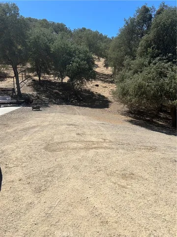 a view of ocean with a mountain