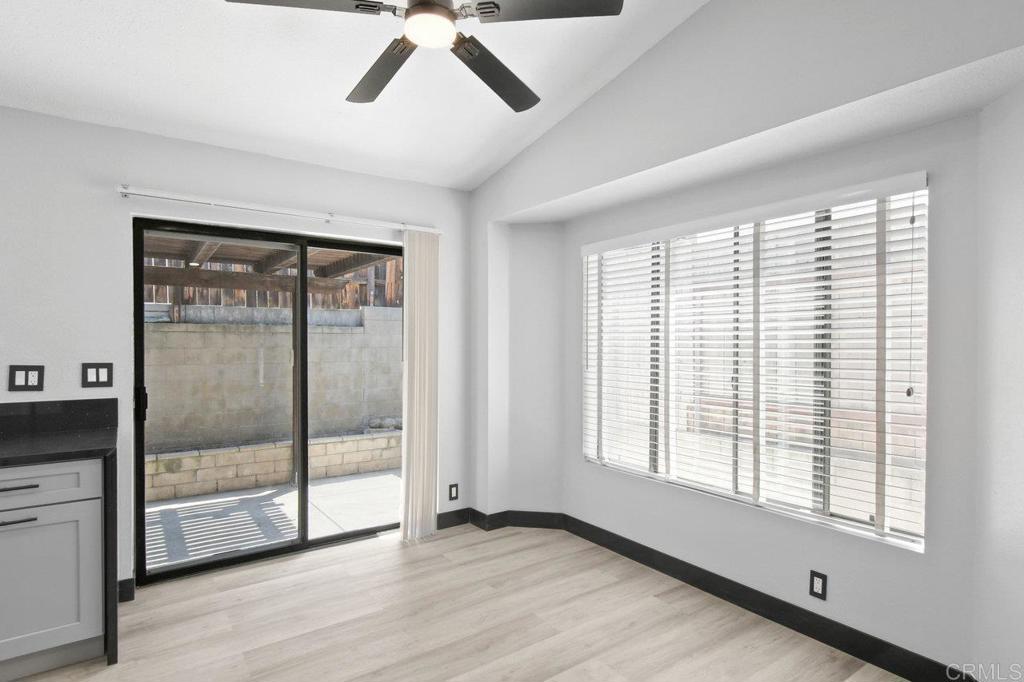 8409 Sleepy Way El Cajon, CA 92021 - Photo 13 of 31 a view of an empty room with glass door