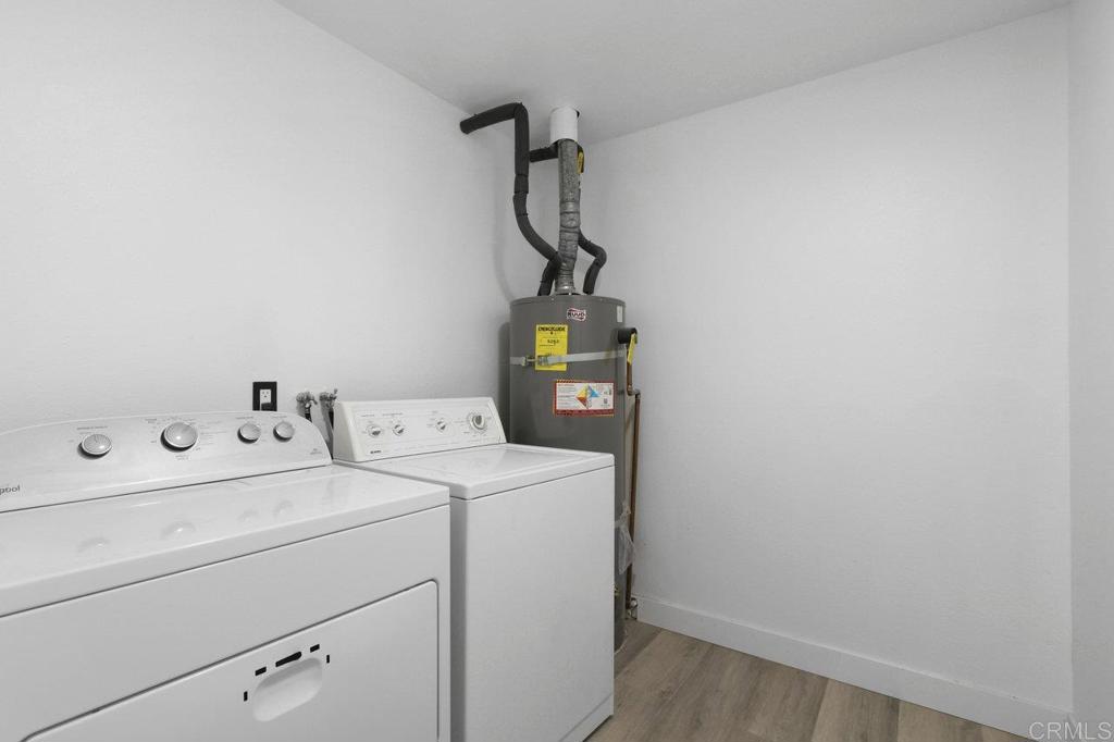 8409 Sleepy Way El Cajon, CA 92021 - Photo 14 of 31 a utility room with dryer and washer