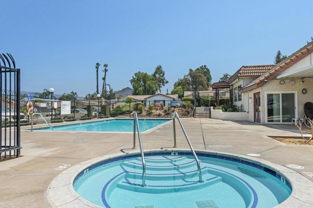 8409 Sleepy Way El Cajon, CA 92021 - Photo 29 of 31 a swimming pool with a yard and seating area