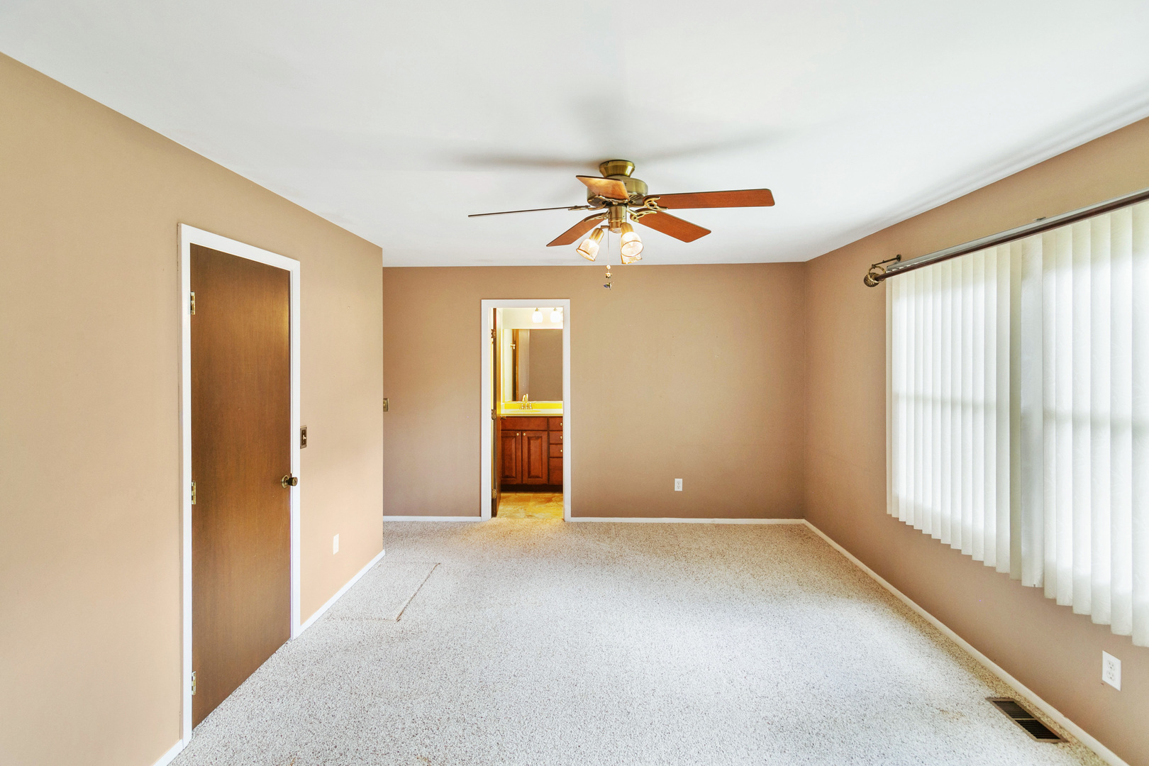 314 Boulder Hill Pass Montgomery, IL 60538 - Photo 11 of 19 a view of an empty room with a window