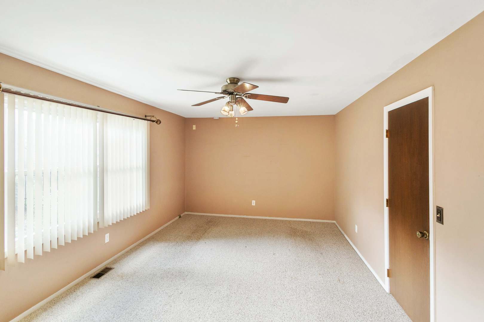 314 Boulder Hill Pass Montgomery, IL 60538 - Photo 12 of 19 a view of an empty room with a window
