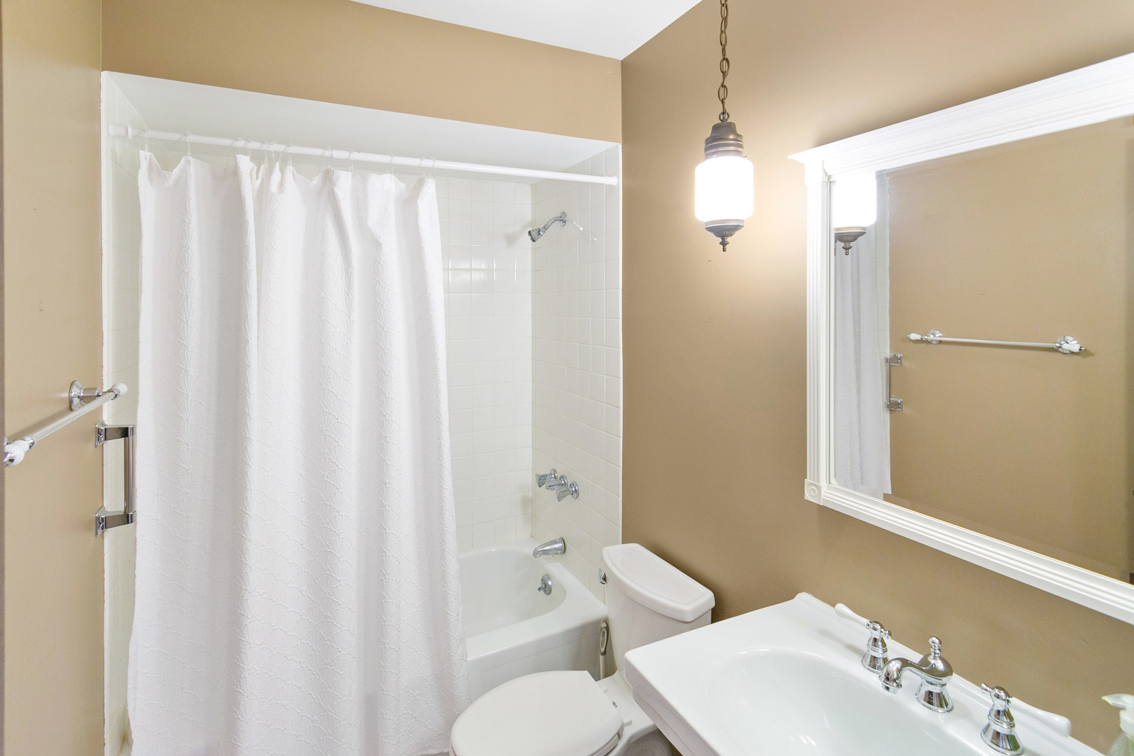 314 Boulder Hill Pass Montgomery, IL 60538 - Photo 16 of 19 a bathroom with a sink and a mirror